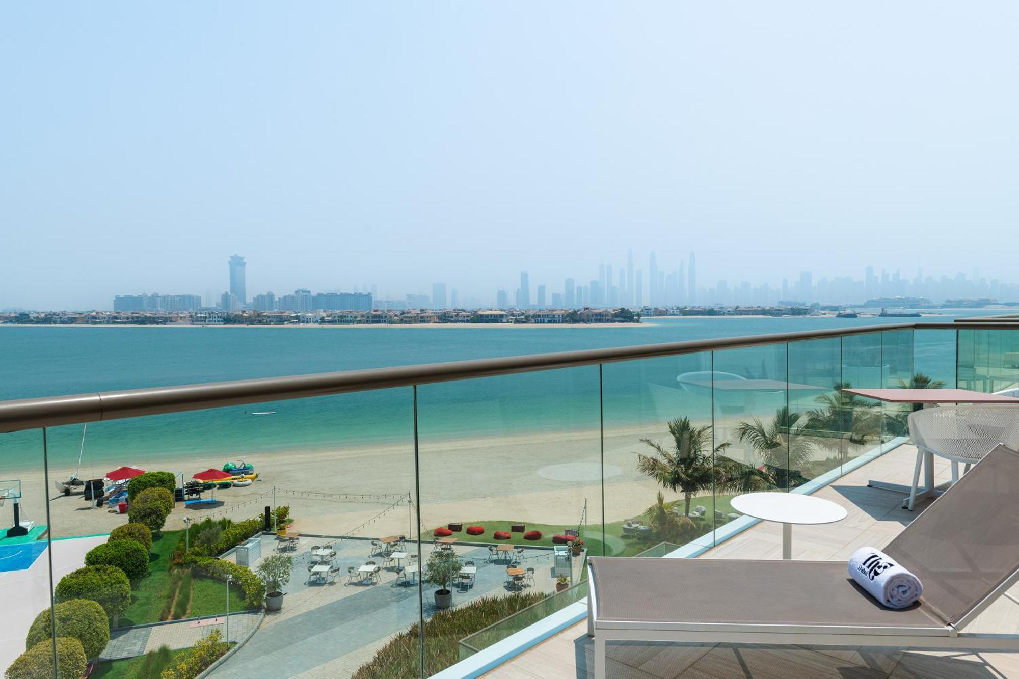 Th8 Palm Dubai Beach Resort, Vignette Collection By Ihg Exterior photo View of the Palm Jumeirah from the hotel